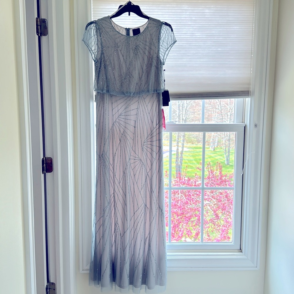 Adrianna Papell formal gown.  NWT. Light blue, fully lined. Beading perfect.